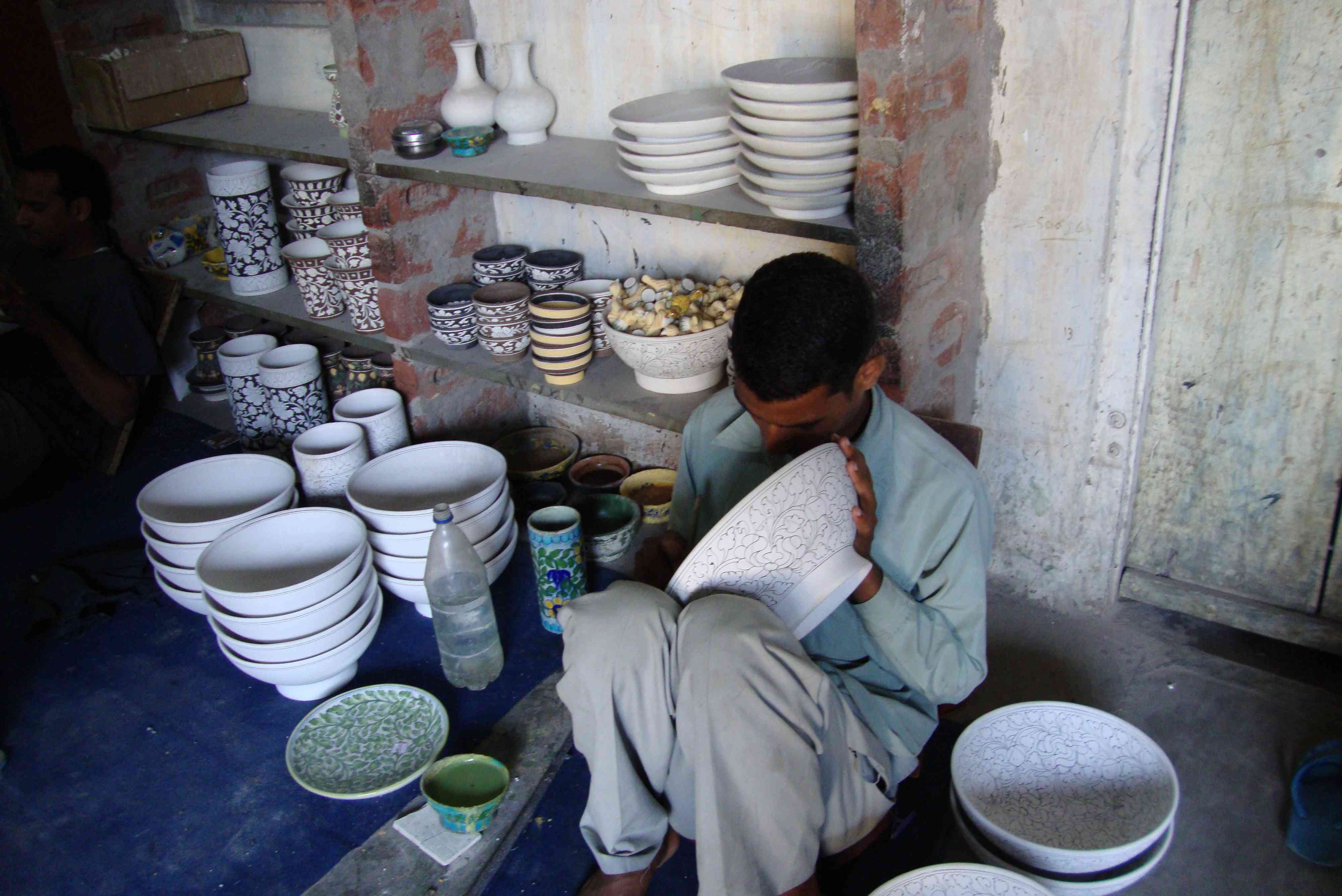 painting blue pottery