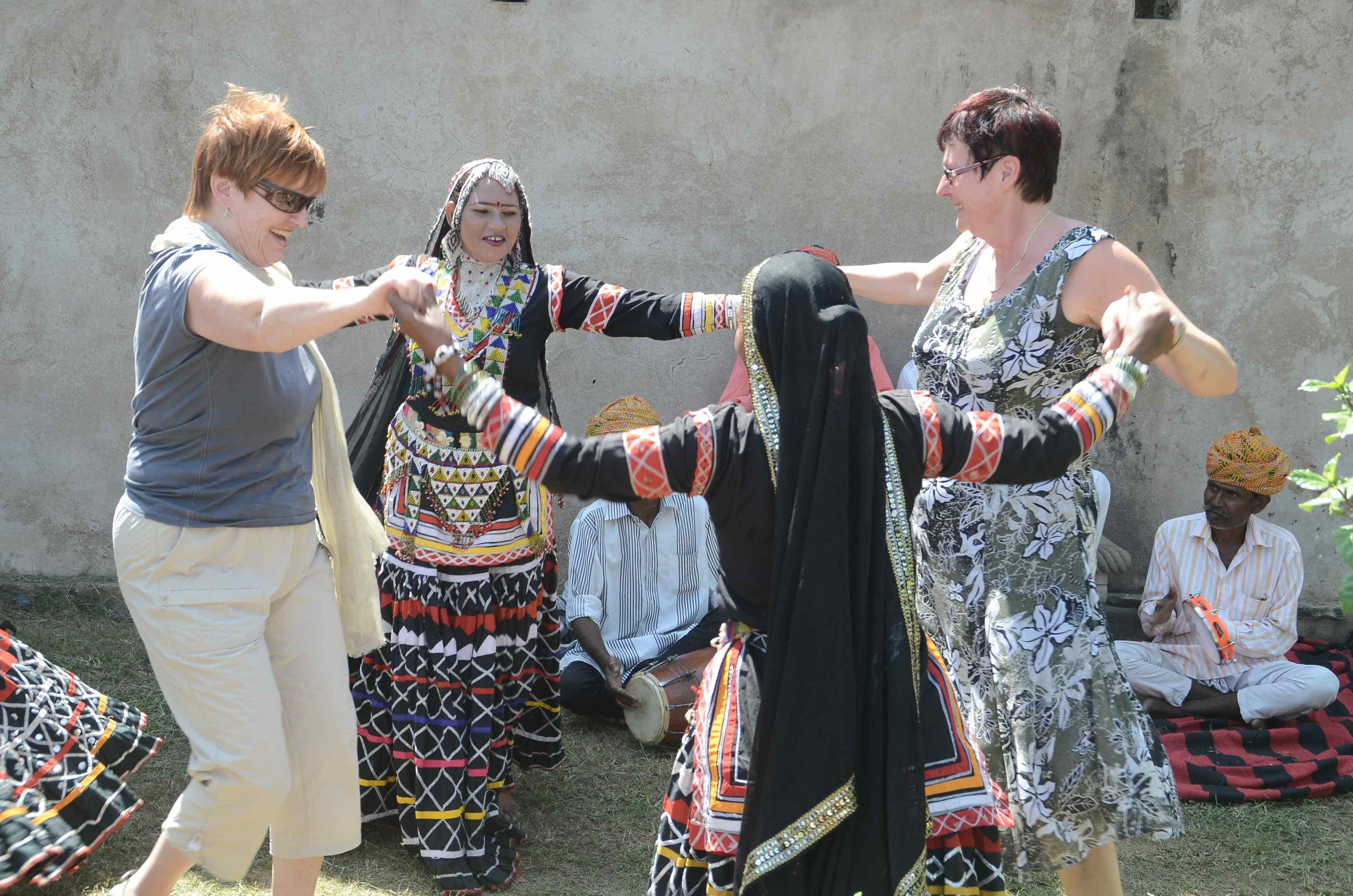 Dancers performing Kachchi Ghodhi dance, and the foreign guests joined in.